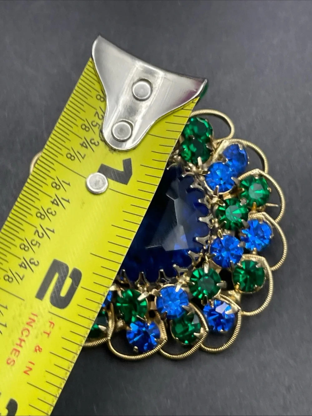 Rhinestone and metal scroll work brooch vintage
